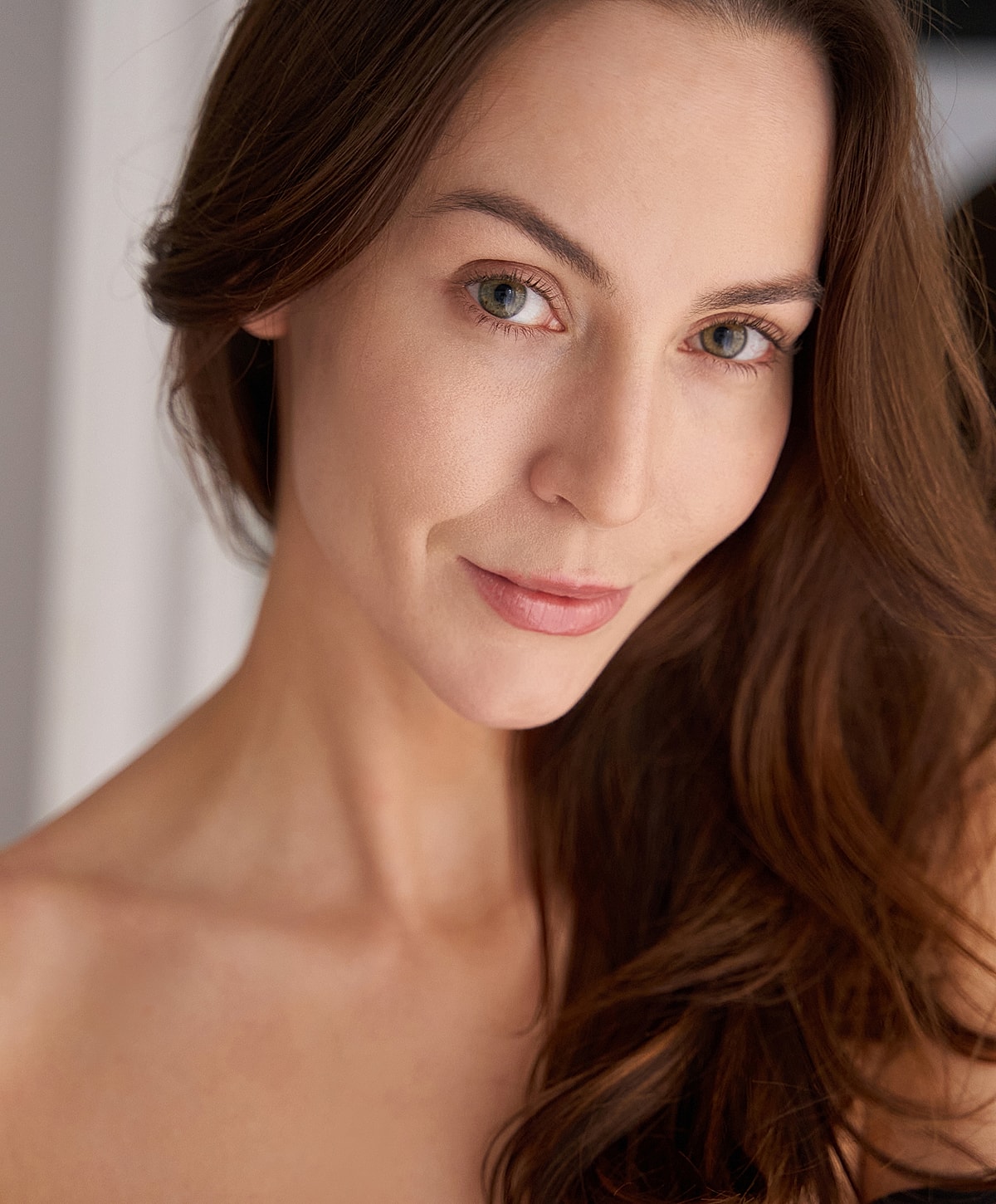 Portrait of a woman with long hair.
