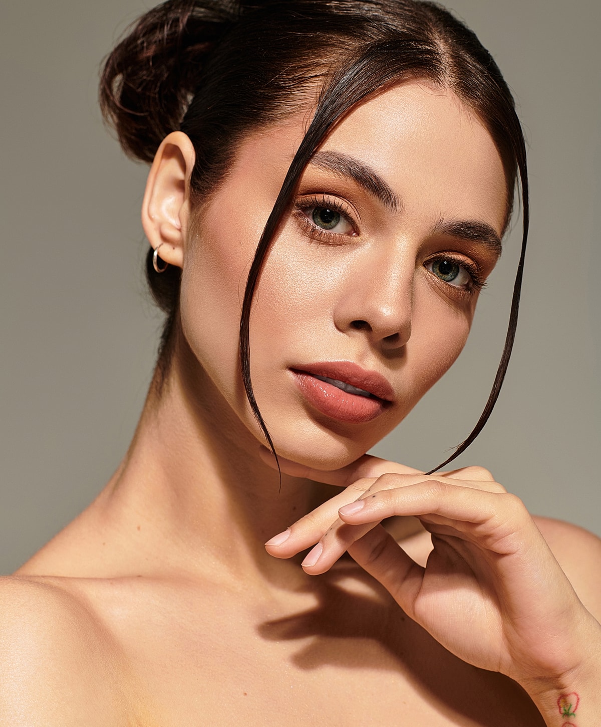 Portrait of a woman with a thoughtful expression.