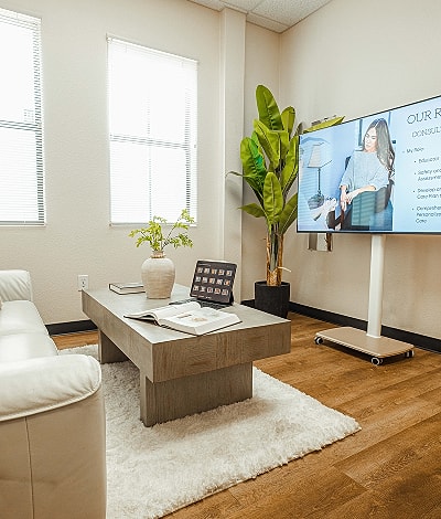 Businessman standing confidently in tailored suit.
